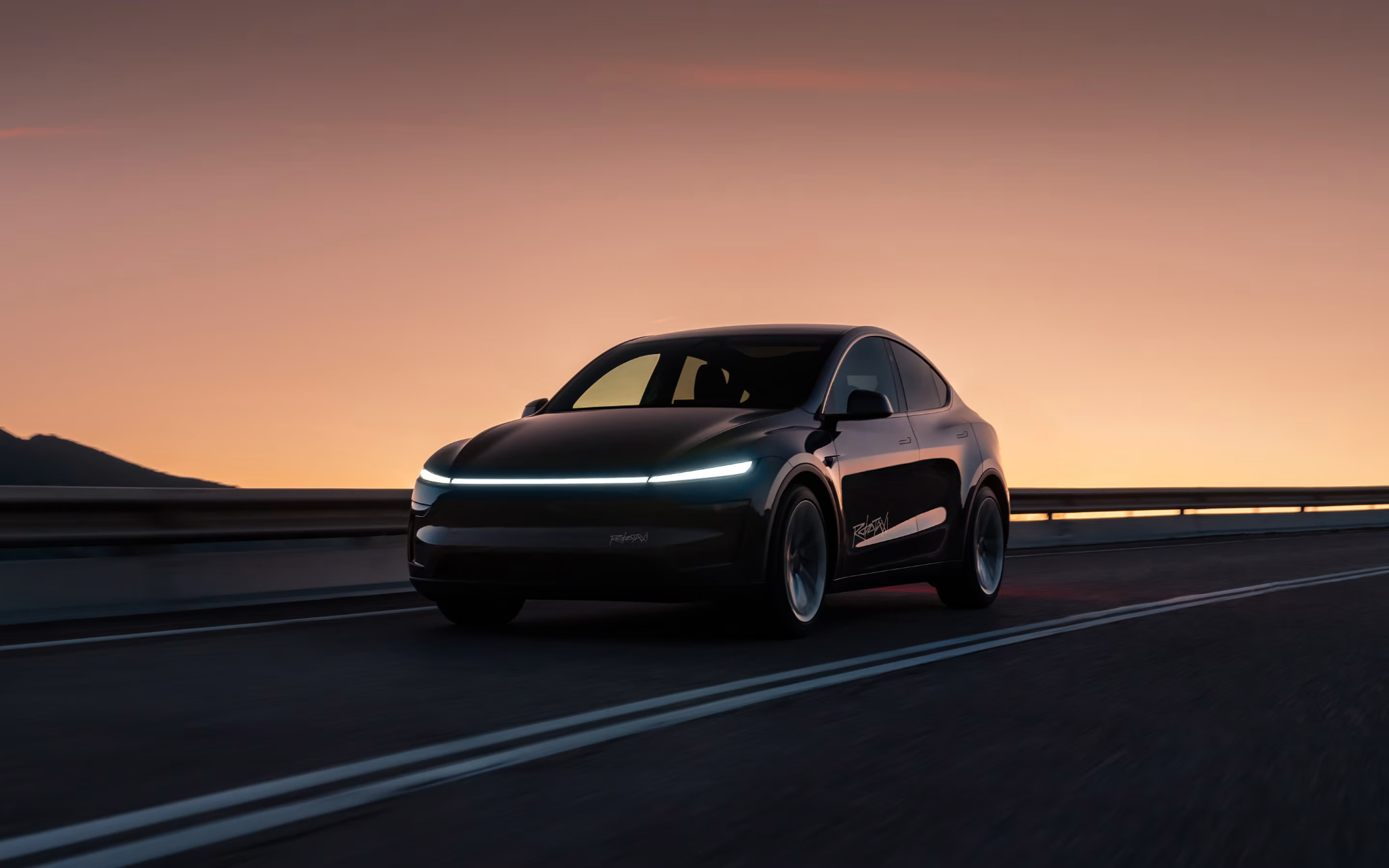 Conceptual autonomous vehicle traveling through a U.S. landscape